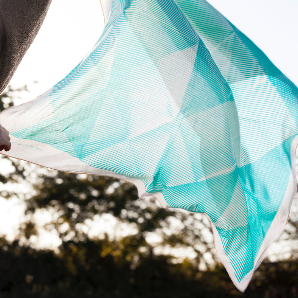 “Folded Paper” furoshiki textile in emerald green and cream