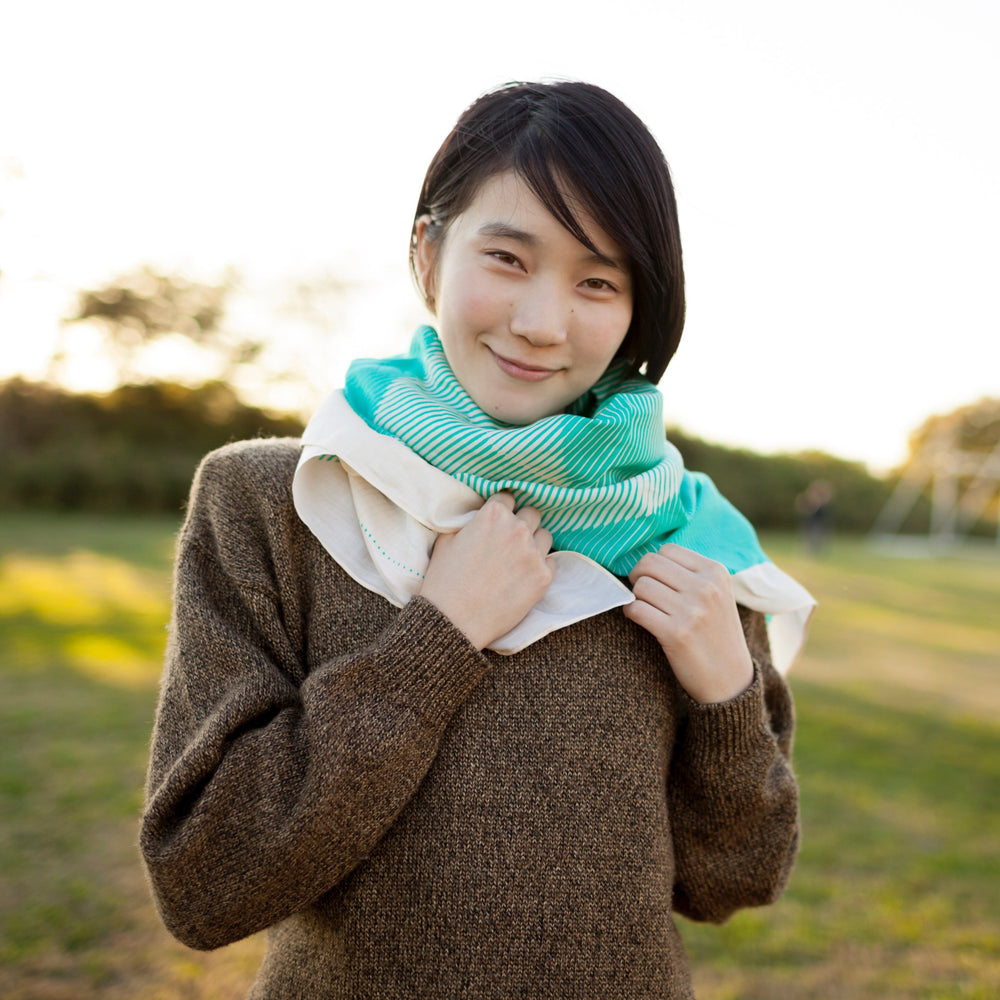 “Folded Paper” furoshiki textile in emerald green and cream